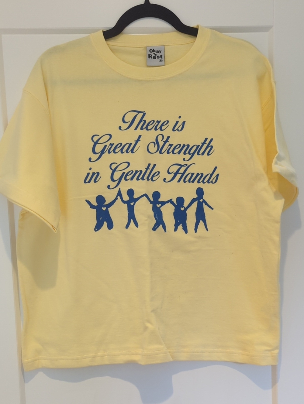 Women's Yellow Graphic Tee - "Great Strength in Gentle Hands"